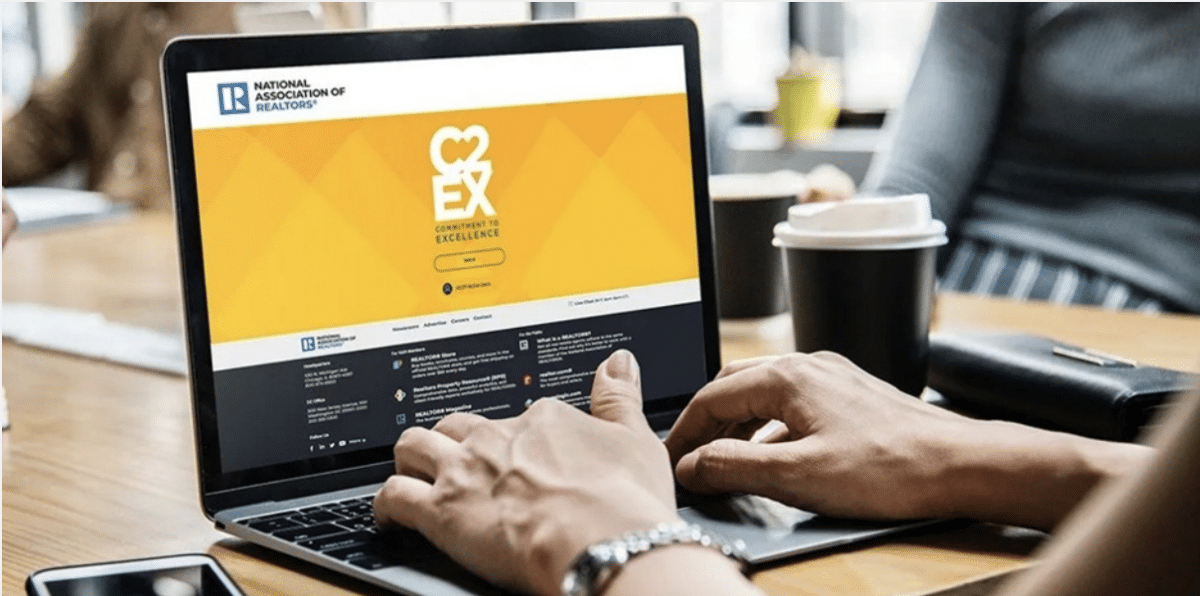 REALTOR® completing training on a laptop